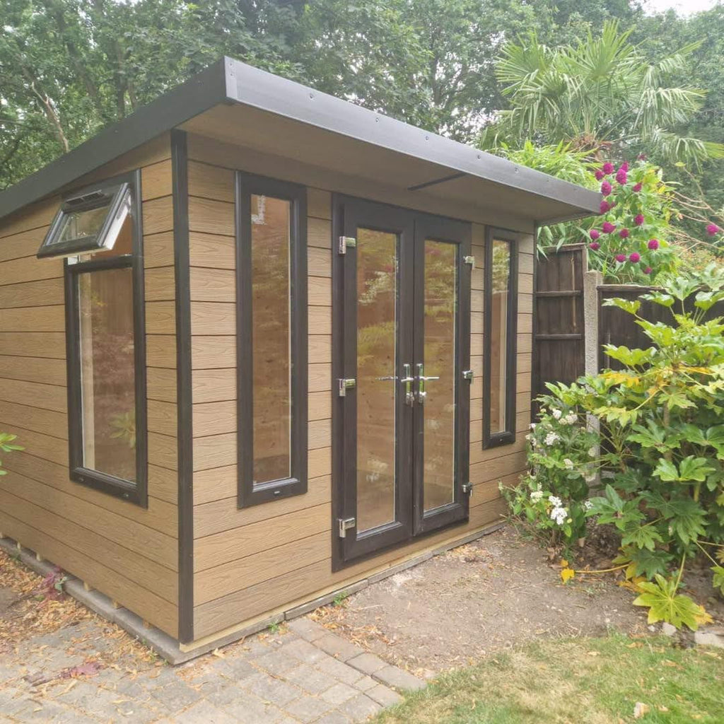 Suresheds Kingsdale Contemporary composite garden room in oak timber-look composite cladding with dark brown trims