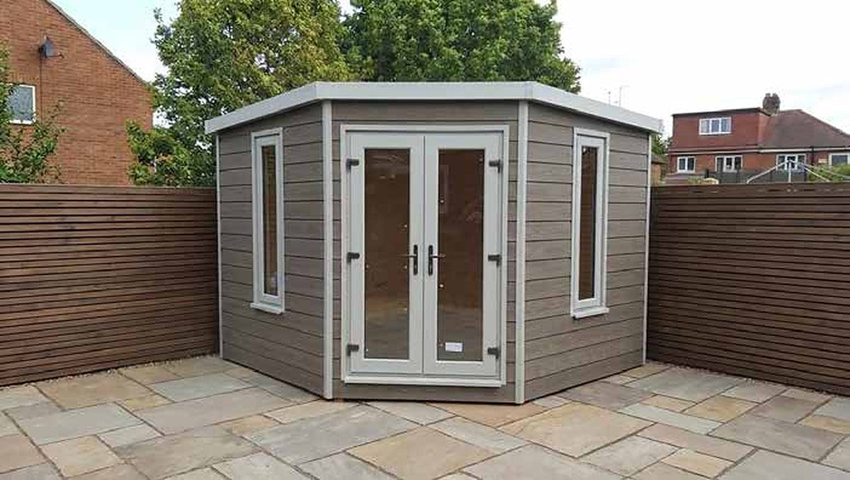 Composite Swaledale Contemporary Corner by Suresheds – grey composite cladding with UPVC French doors