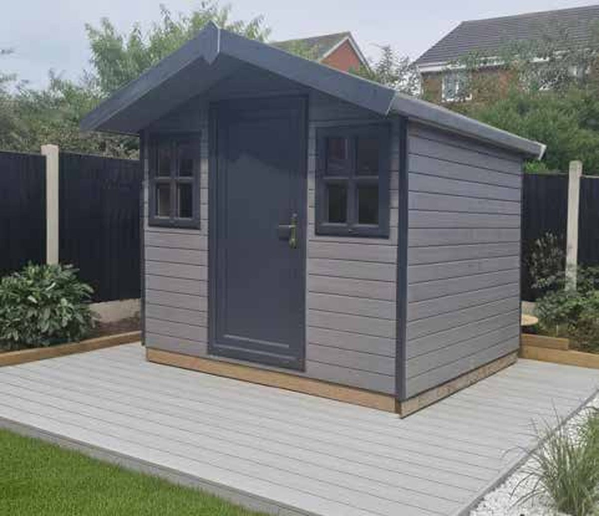 Composite Ingleton Lodge by Suresheds – grey composite cladding, apex roof, UPVC door and Georgian windows