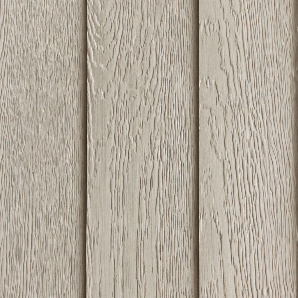Close-up of the factory-primed LP SmartSide embossed wood-grain exterior before painting