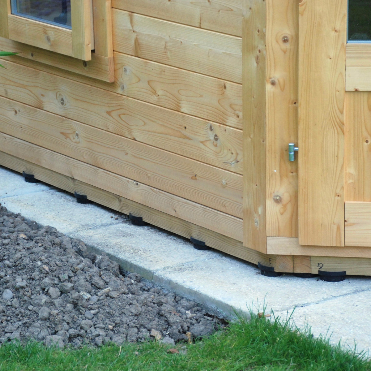 Shed Boots fitted under a shed base